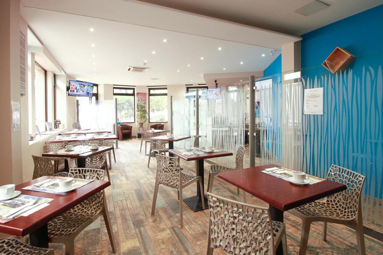 Hotel La Couronne Marmande Bagian luar foto